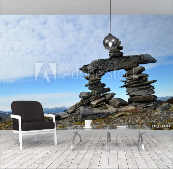 Bild på Stone cairn stone man trailmark construction on top of a mountain in subarctic Swedish Lapland